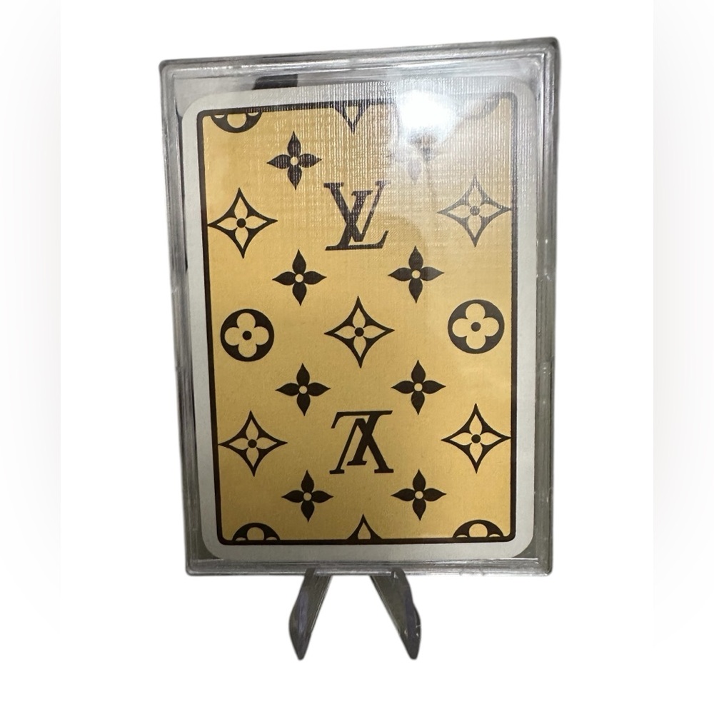 Authentic Louis Vuitton playing card Queen in a display case New